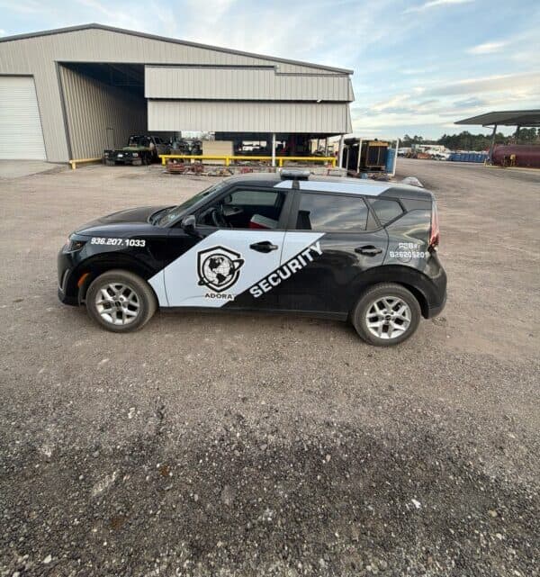 Adora patrol car outside of a warehouse
